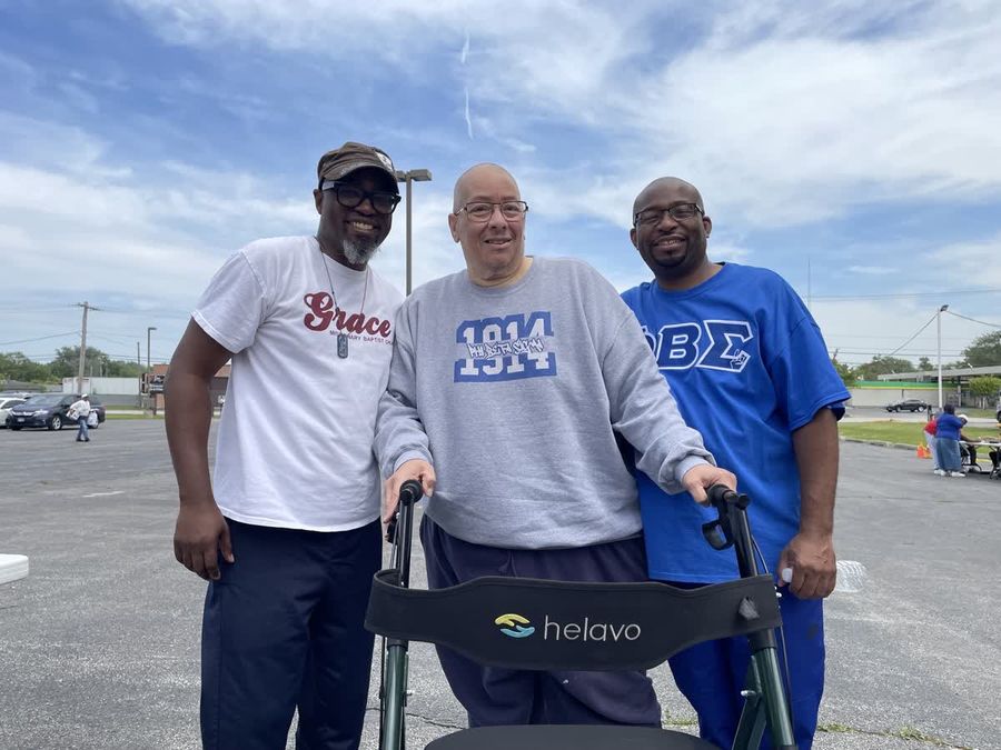 Three brothers in Grace, 1914, and Phi Beta Sigma shirts