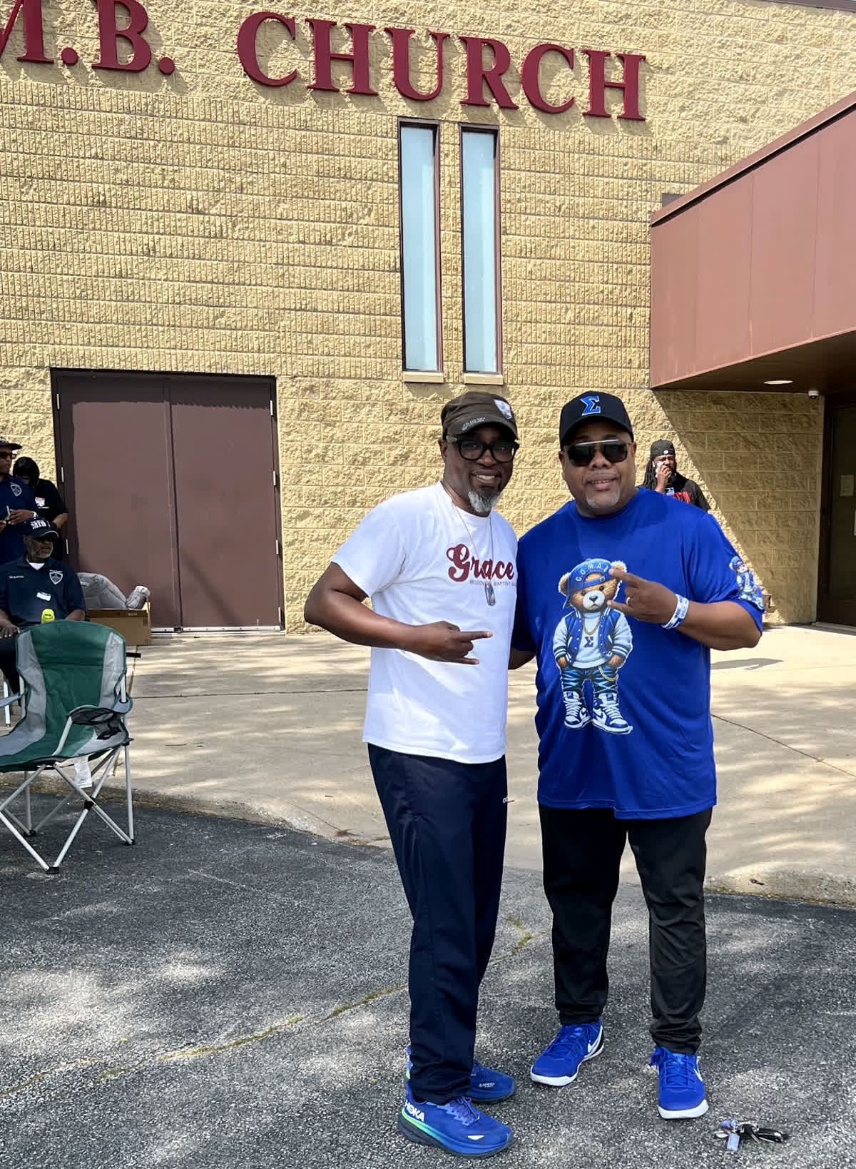 Brothers outside a church on a service day